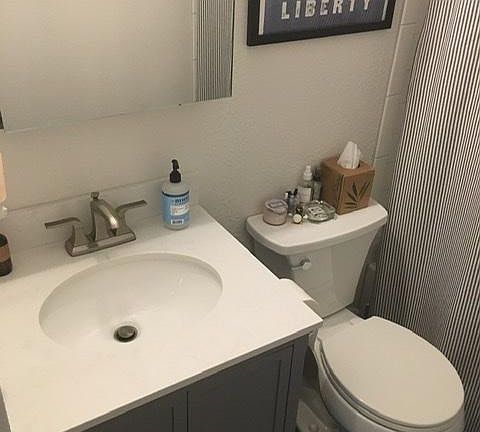 Bathroom fully remodel summer 2020. Lots of storage between mirror medicine cabinet and vanity with bottom drawer.