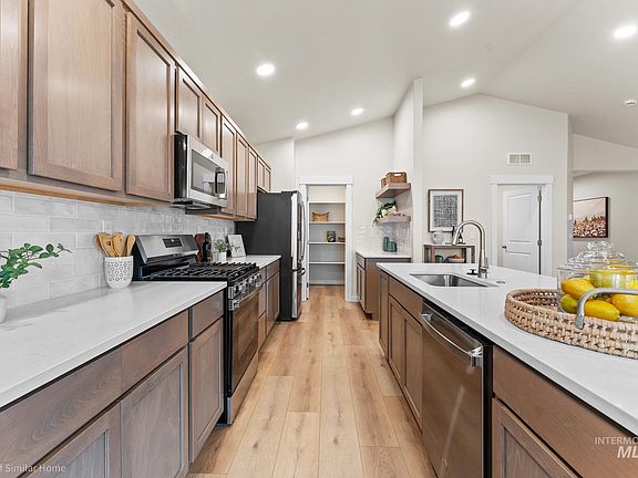 5th image of 5874 N Garbo Ave