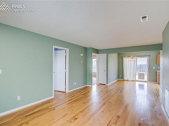 Living room with hardwood flooring