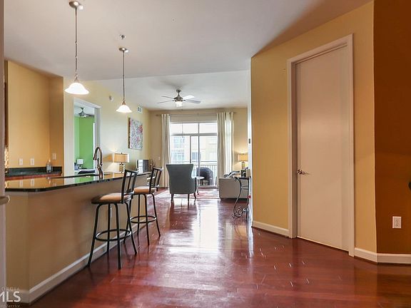 2nd image of 711 Cosmopolitan Dr NE #312