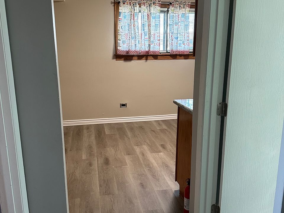 Entrance to Kitchen that faces Archer Ave