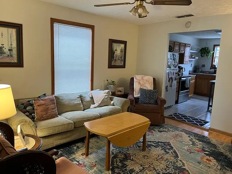 Family room facing kitchen (furniture belongs to current residents)