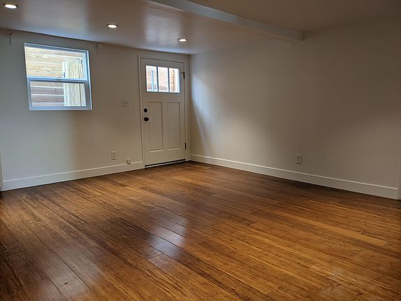 Living room and entrance to unit.