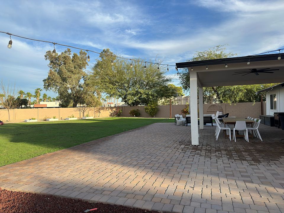 1/3 acre backyard - huge pavered patio with string lights
