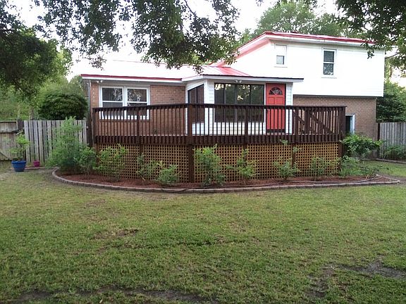 Beautifully landscaped back view