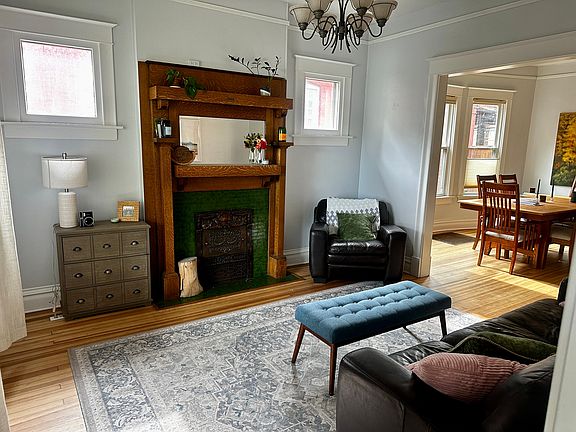 Cozy living room with original fireplace