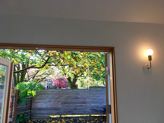 Double French doors open out to private yard and separate gu