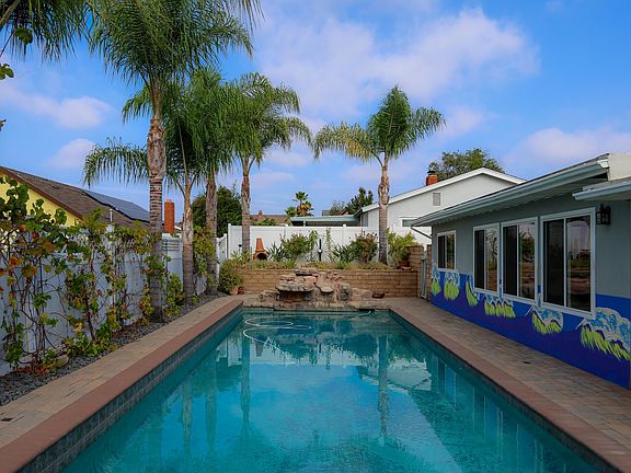 Pool w/ Infinity Hot Tub + Water Feature