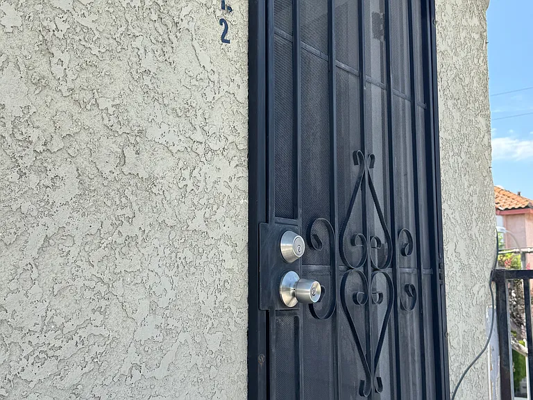 Rear door with iron gate