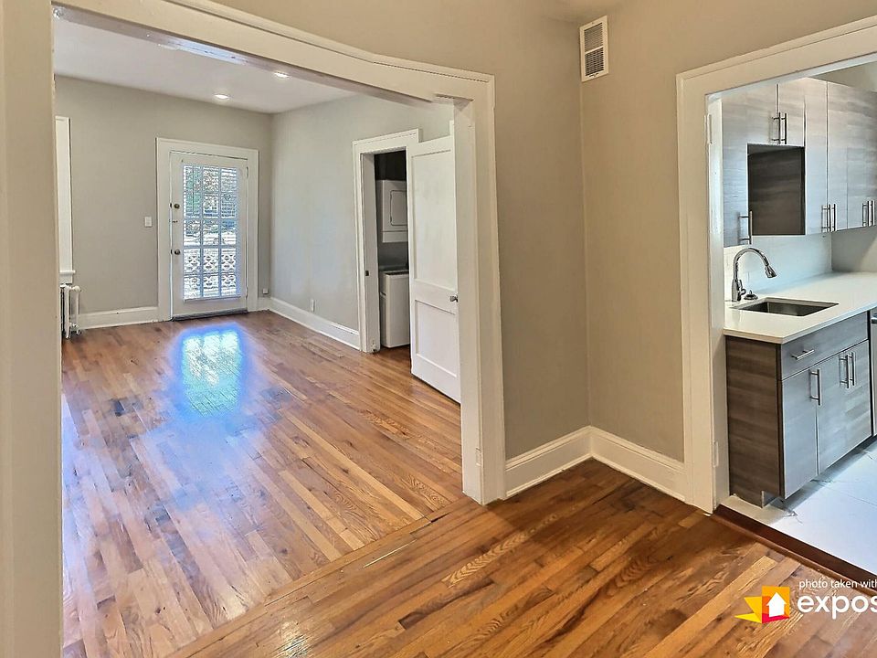Sunny living room with access to the porch.