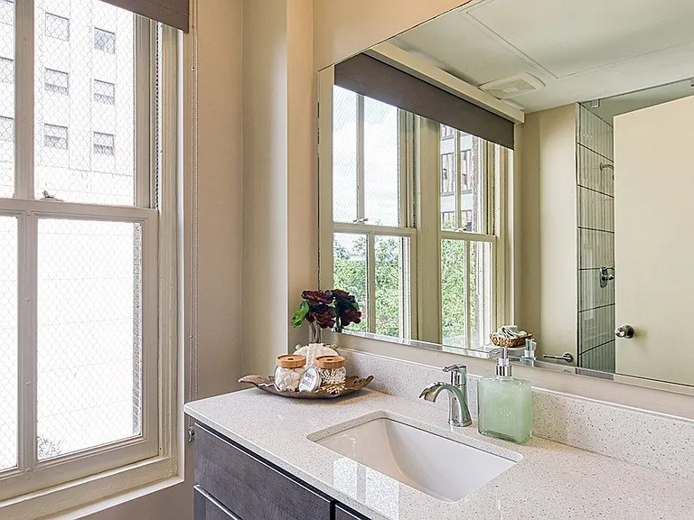 Modern bathrooms with quartz and designer cabinets