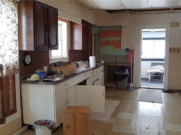 Kitchen from LR doorway towards back porch