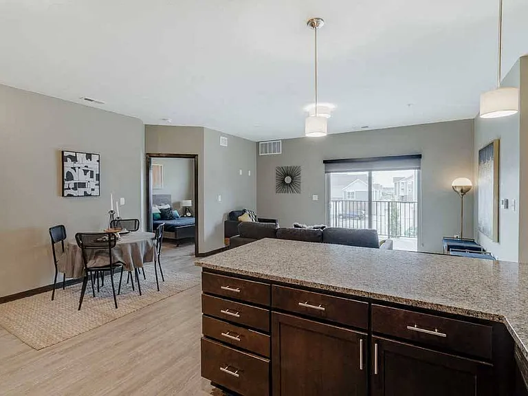Entertaining is made easy in the 2-bed Magnolia featuring a large peninsula granite countertop.