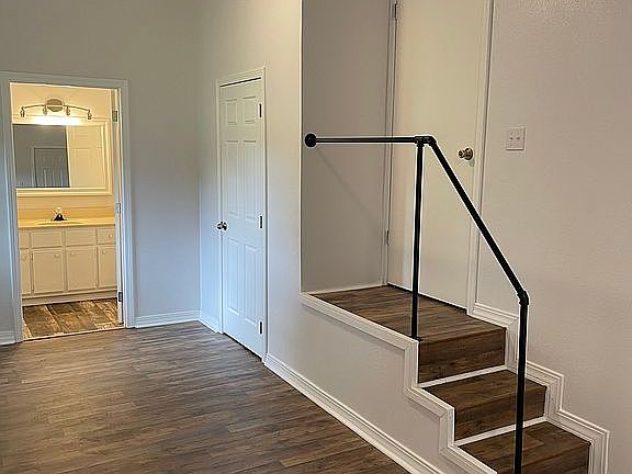 Stairs leading to kitchen.