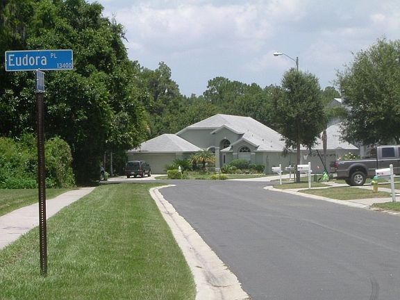 View down street to house