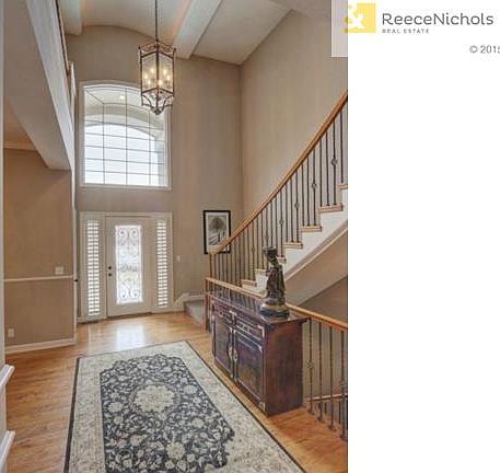 Grand two story entry with loads of daylight and hardwood floors