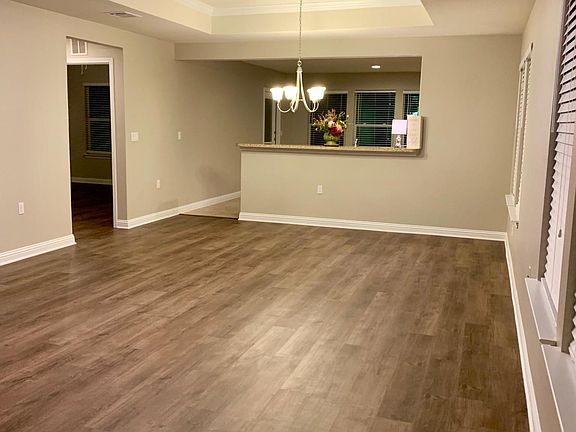 Living room with tray ceiling.