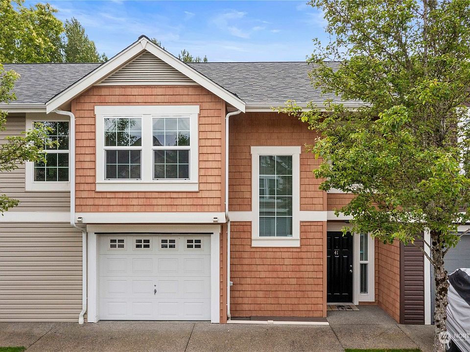 Front of home with 2-car driveway parking>