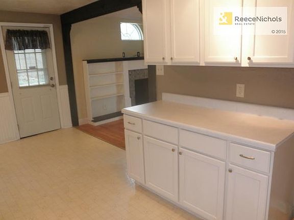 Nice kitchen cabinets with good flow to the eating area and livi