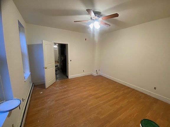 Bedroom facing door to kitchen