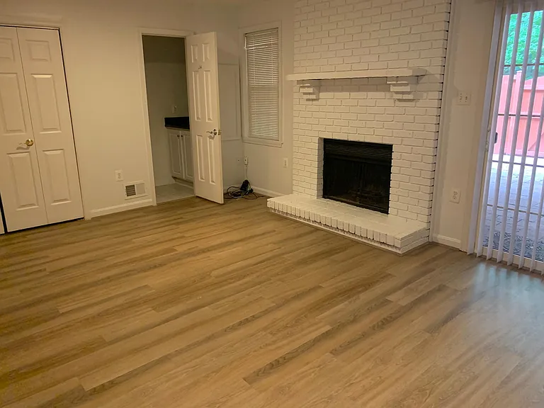 basement with wood fireplace