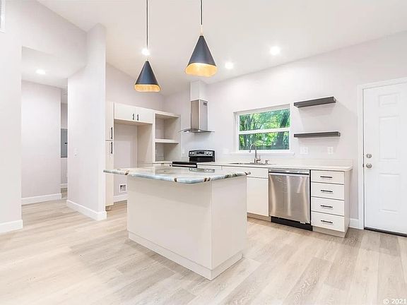 Kitchen and entry into pantry/laundry (refrigerator will be included with rental)