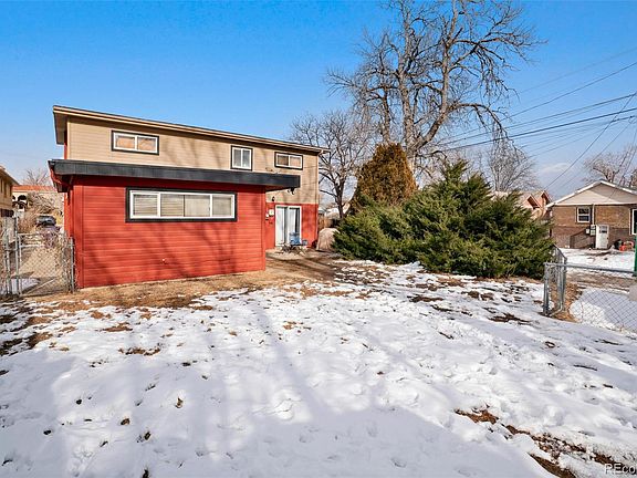 Back of house and private fenced in yard