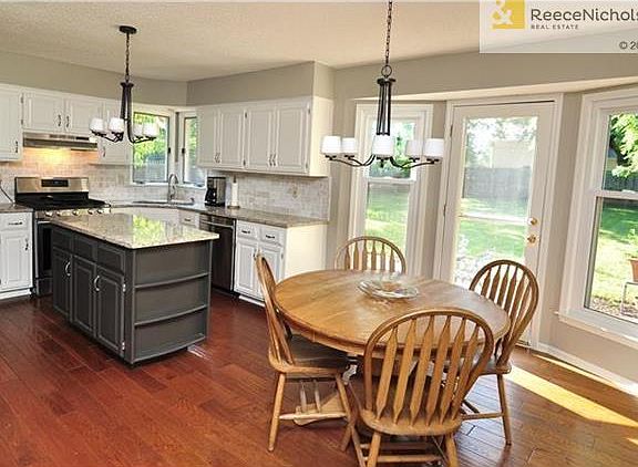 Granite counters, stainless appliances and subway backsplash