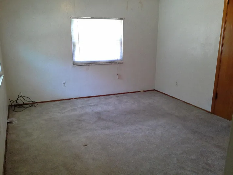 Master bedroom ( 1/2 room shown - ceiling fan and closet not showing)