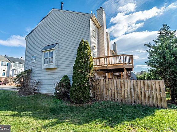 Newer Fenced in Rear Yard with Deck