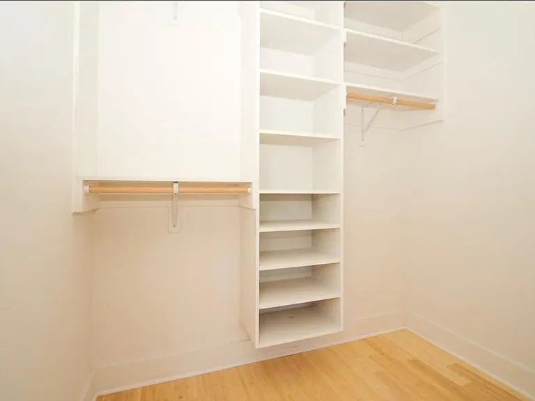 Main bedroom with ample natural light and walk-in closet