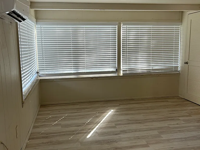 Family room is large with windows all around