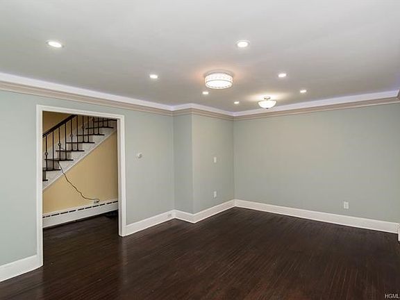 The living/dinning area is one of the largest rooms with bright canister LED lights and two ceiling hugging lights. One will center your dinning table and the other for your living room furniture. This room also receives natural light from the bay and standard window.