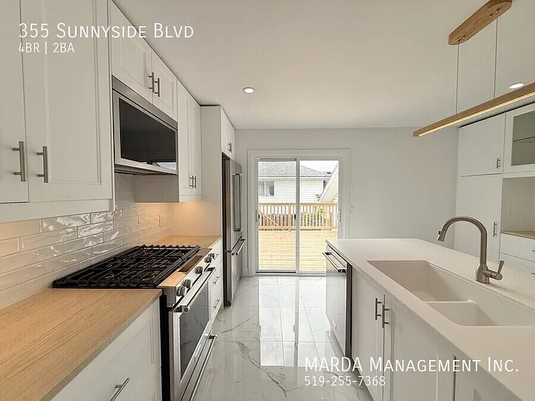 355 Sunnyside Blvd — Photo 10