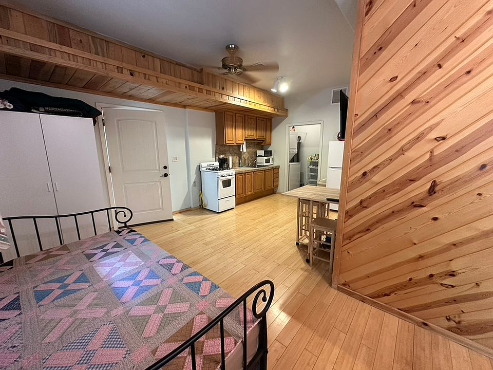 Walking in. Extra trundle bed to the left. Stand up extra closet (white) far left. White door is actually locked both sides - no access to house garage or In-Law Unit.