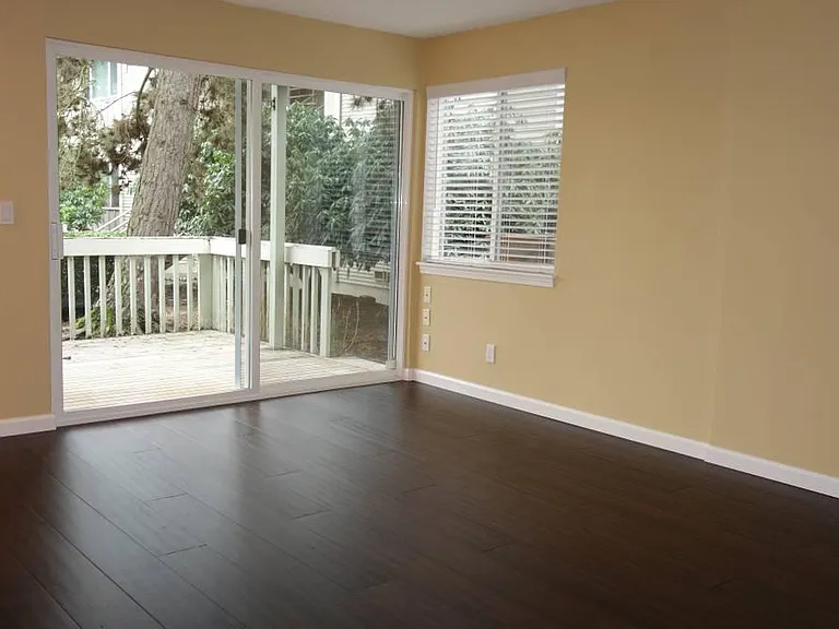 Large, Light and Bright Living Room with Slider to Private Deck