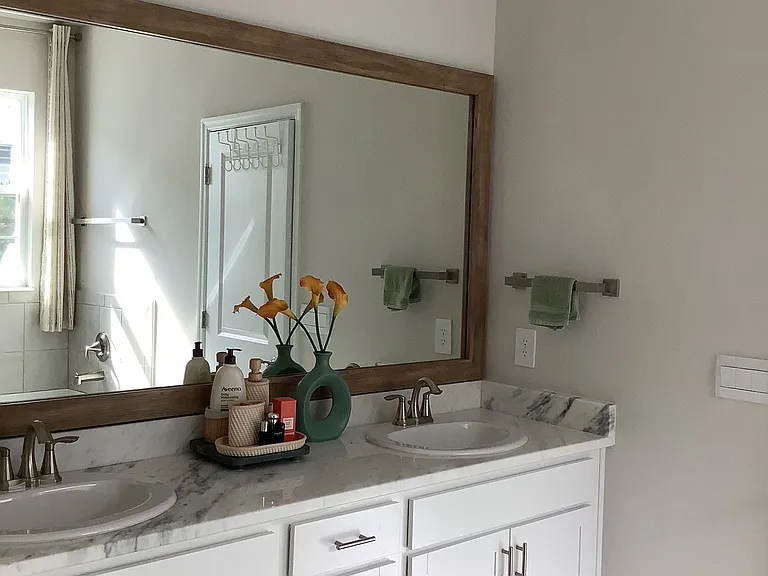 "Double vanity in primary en suite bathroom"