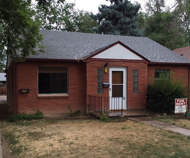 House with cottage behind