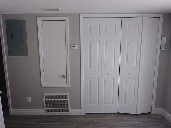 Electric Panel, A/C closet then Laundry closet