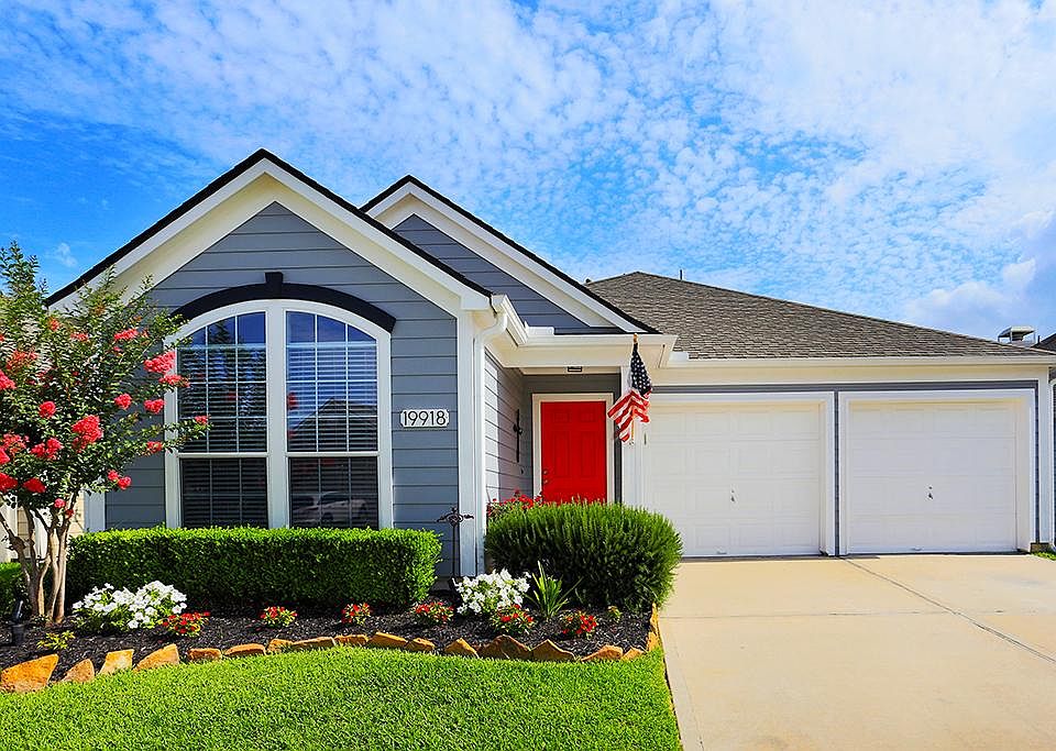 Great curb appeal on this beautifully Perry Home. Please note red door will have to be repainted to 