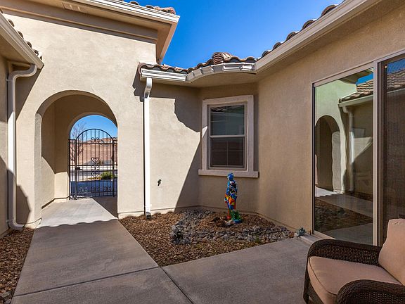 4th image of 9256 Wind Caves Way NW