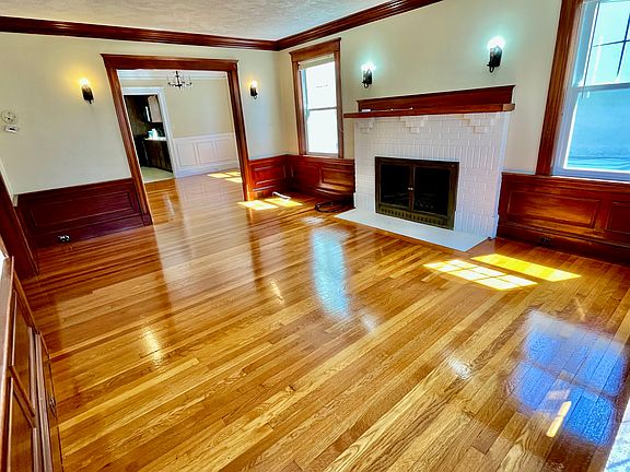 Living room including working fireplace
