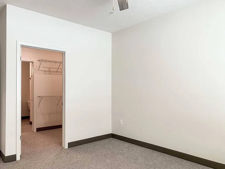 Where style meets function, and your path to relaxation begins with every step through this walk-through closet into your private oasis.