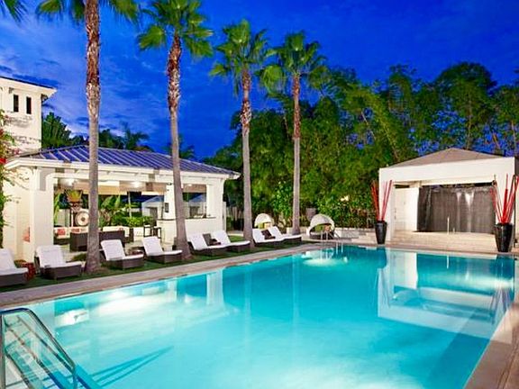 Pool, cabanas, outdoor spa & grill with outdoor living room,