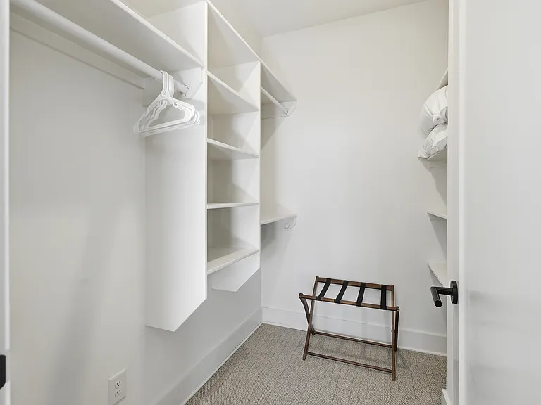 Bedroom 3 with a full over queen bunk bed, ensuite bathroom, and dresser for your belongings. Also includes a walk-in closet. Located on the 3rd floor.