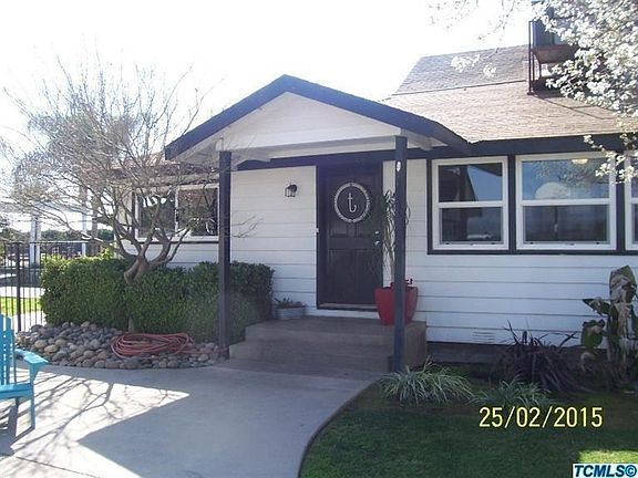 Picture of the front door welcoming you to the warm home inside!