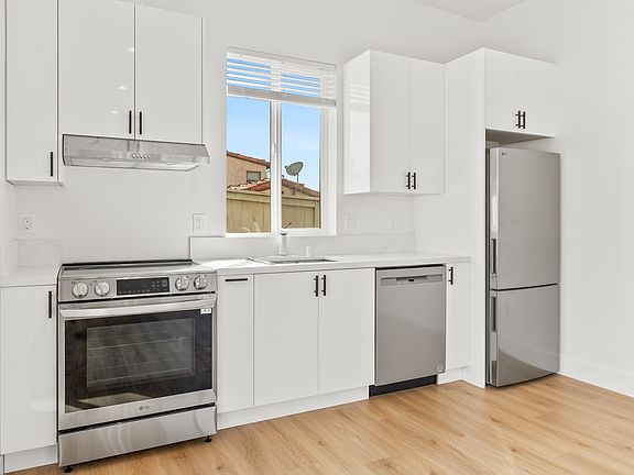 Brand new stainless steel appliances in kitchen