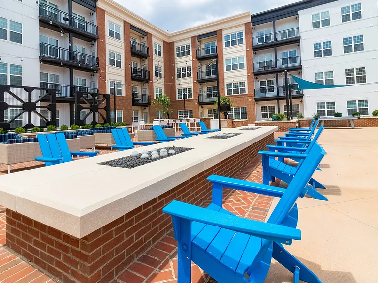 When the weather gets cold, there's plenty of chairs to cozy up near the fire table.