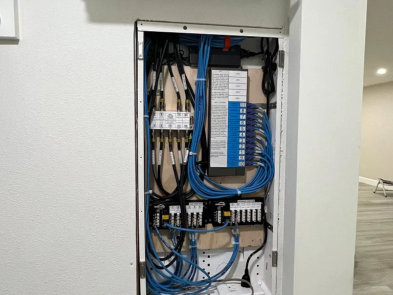 Structured Media Hub in main Entry Closet with Bi-Fold Door Pict 3