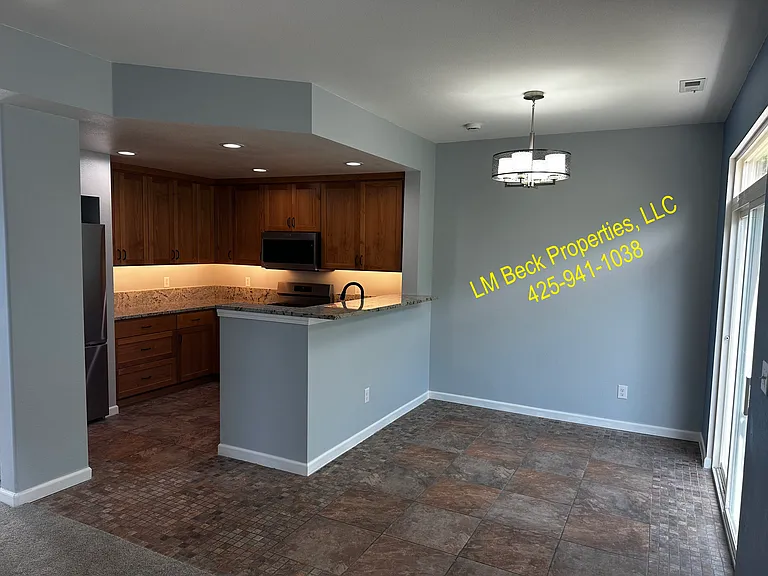 7524 Greenloft Ave NE — Photo 2